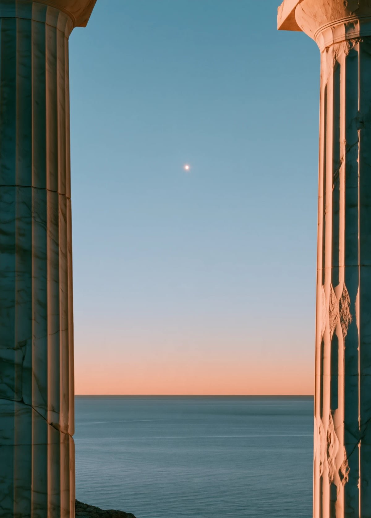 A pre-dawn sky between two marble columns, with a single star above a calm sea